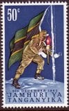 Lieutenant_Alex_Nyirenda_rising_Tanganyika_flag_@_Uhuru_peak_(50_cents_stamp).jpg